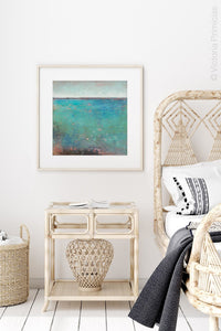 Colorful abstract beach wall decor "Tides End," digital print by Victoria Primicias, decorates the bedroom.