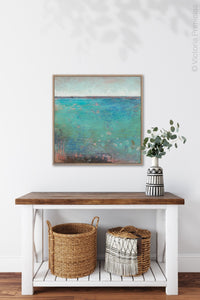 Turquoise abstract beach wall decor "Tides End," canvas art print by Victoria Primicias, decorates the entryway.
