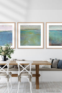 Turquoise abstract coastal wall decor "Tides End," wall art print by Victoria Primicias, decorates the dining room.