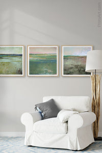 Square contemporary abstract landscape art "Tuscan Strands," printable wall art by Victoria Primicias, decorates the living room.