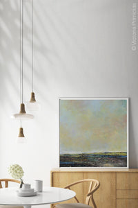 Serene abstract landscape art "Twilight Blush," digital print by Victoria Primicias, decorates the dining room.