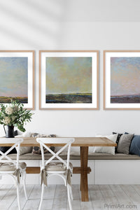 Serene abstract landscape art "Twilight Blush," digital download by Victoria Primicias, decorates the dining room.