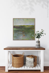 Green abstract landscape painting "Verdant Excuse," metal print by Victoria Primicias, decorates the hallway.
