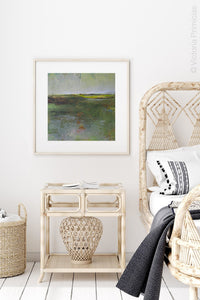 Green abstract landscape painting "Verdant Excuse," metal print by Victoria Primicias, decorates the bedroom.